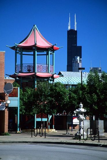 Chicago, Illinois, Chinatown, Pagoda in plaza with Willis Tower (Sears Tower) in the background.