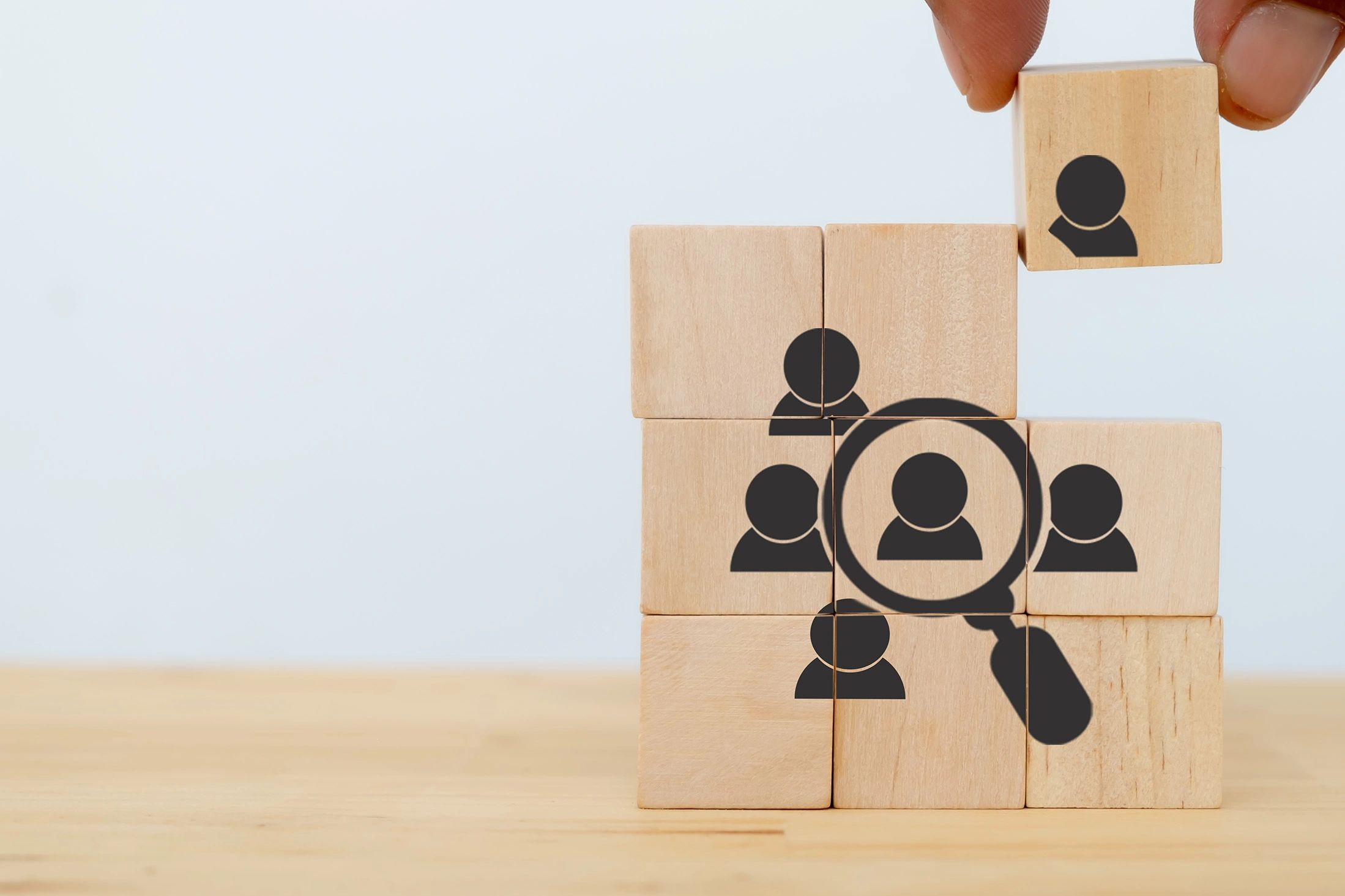 Terms of Service and Privacy: Magnifying glass focusing on one person, Katie Jipp Consulting
