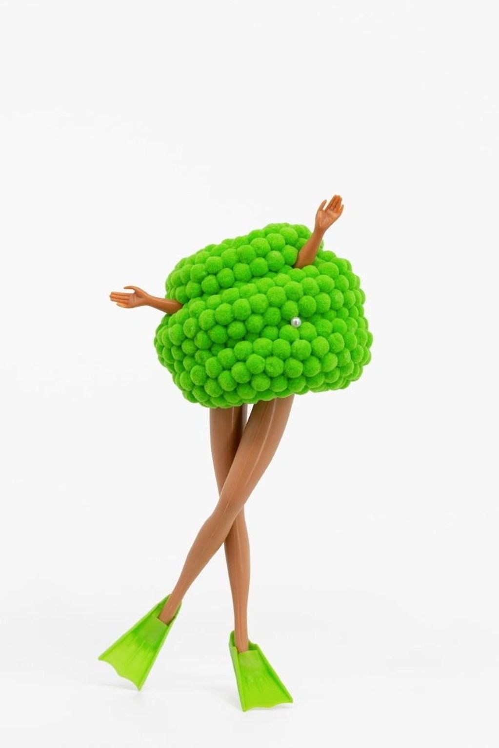 Surreal figure with green pom-pom body and flippers.