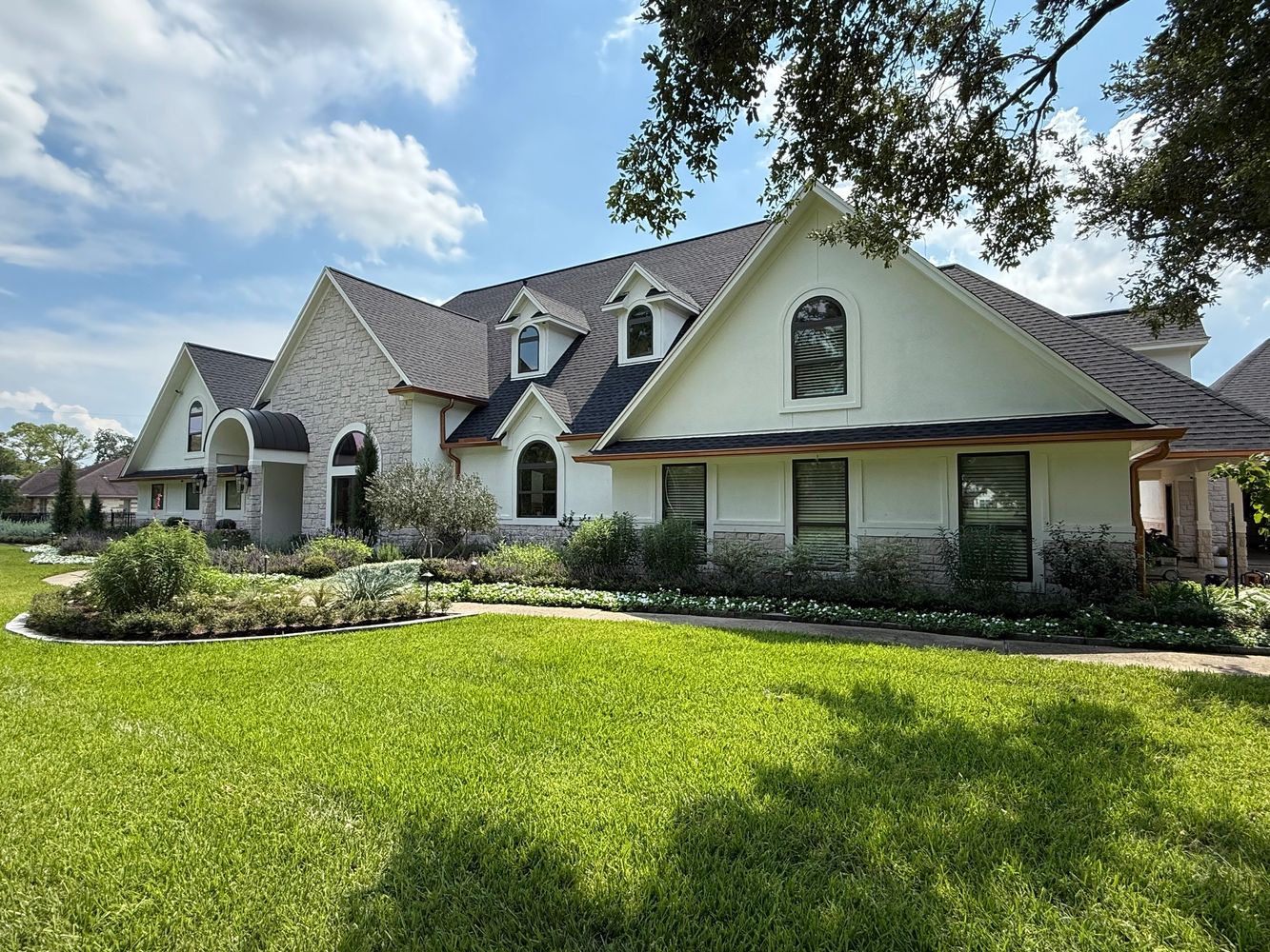 Warm tone Romabio Masonry Flat over stucco & Venetian Glaze over stone by DA Paint Service LLC