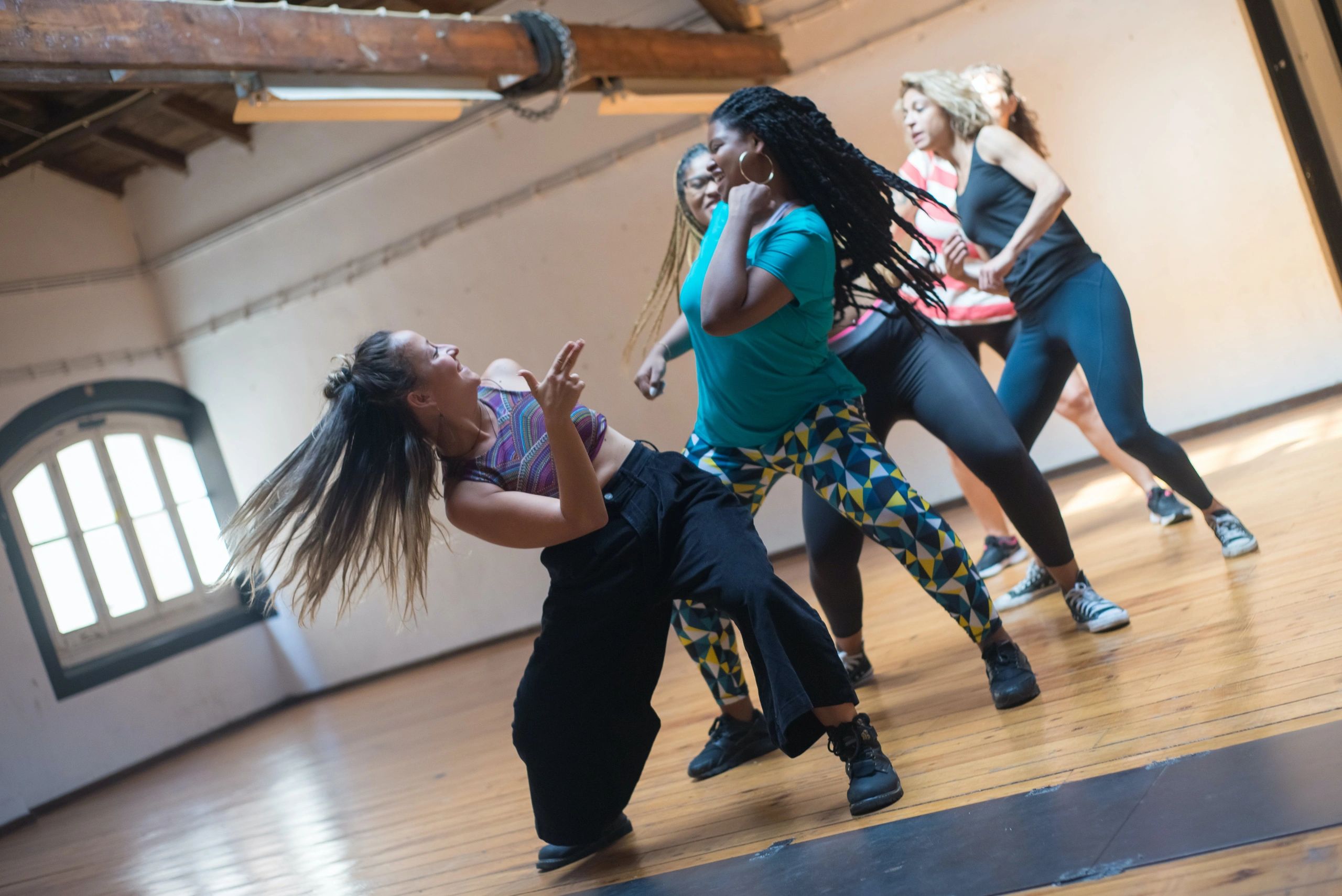 Women dancing in a line