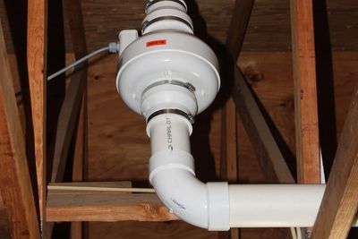 Radon mitigation unit for mitigating levels in a home being bought or sold