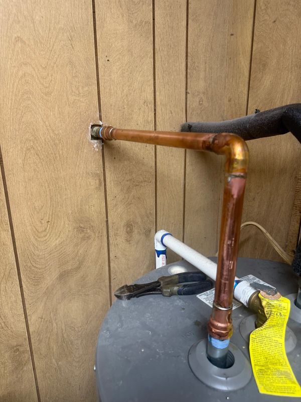 Copper pipe repaired by Serrano's Plumbing Services.