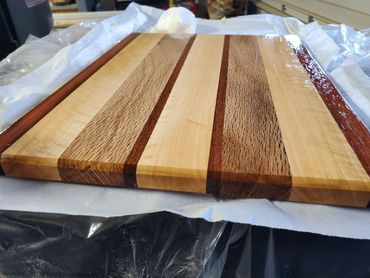 utting board with chamfered edges various hardwoods including Brazilian Cherry, Maple,  Live Oak