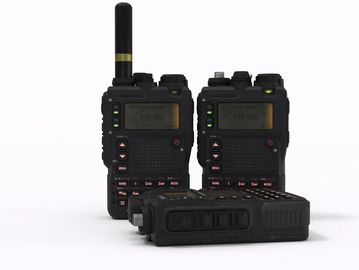 Two walkie-talkies and one laying down on a white background.