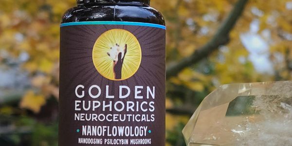 Bottle of Golden Euphorics Neuroceuticals with crystal.