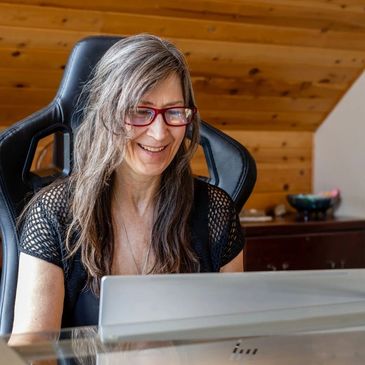 A woman working in her laptop