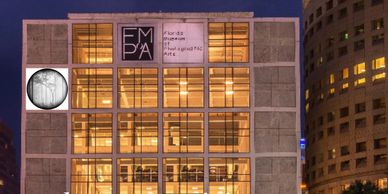 photograph of david monroe's image acceptance on the side of Florida Museum of photographic arts building