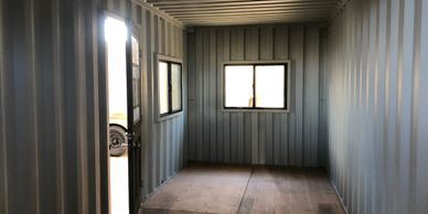 doors and windows inside a shipping container art studio