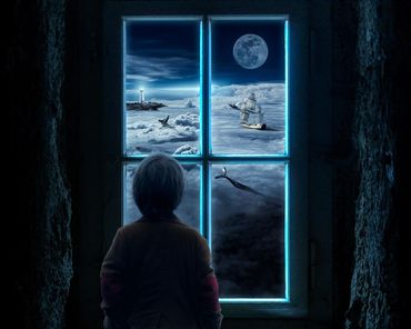 Young boy staring out window daydreaming of a surreal world. 