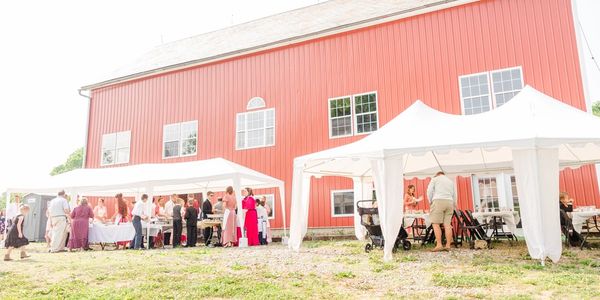 Serving food at an event at the Berry Barn event venue