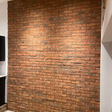 Internal features such as brick slip walls, exposing and refurbishing existing brickwork and firepla