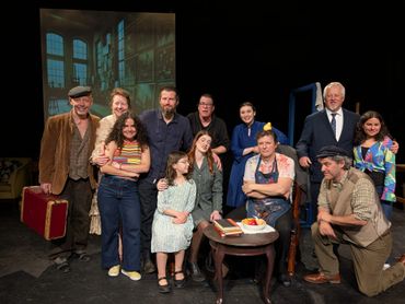 Playwright David McDonald surrounded by the cast and crew of Chagall In New York