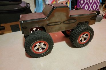 assembly of a welding practice kit. Traxxis wheels example.