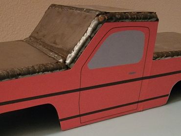 Welding practice kit with sticker example.