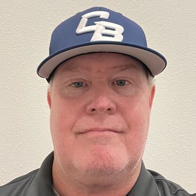 Man wearing a blue and white baseball cap.