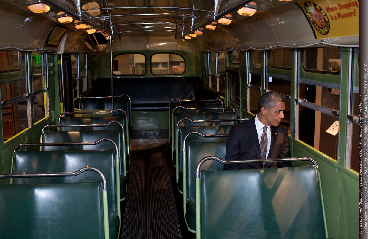 President Barack Obama sits on the famed Rosa Parks bus at the Henry Ford Museum—by Pete Souza 2012