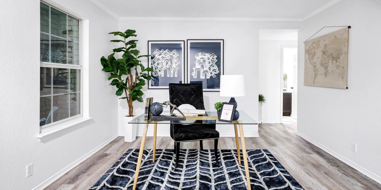 Staged office space with blue rug