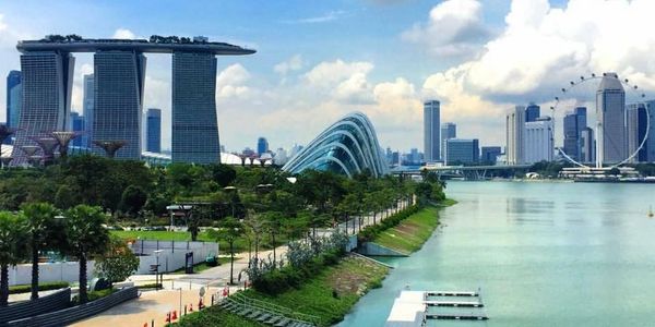 View of Singapore skyline with Marina Bay Sands and Singapore Flyer.