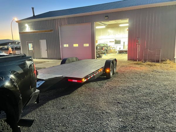 Coated deck on a 2023 prestige mfg 14,000 gvw car hauler.