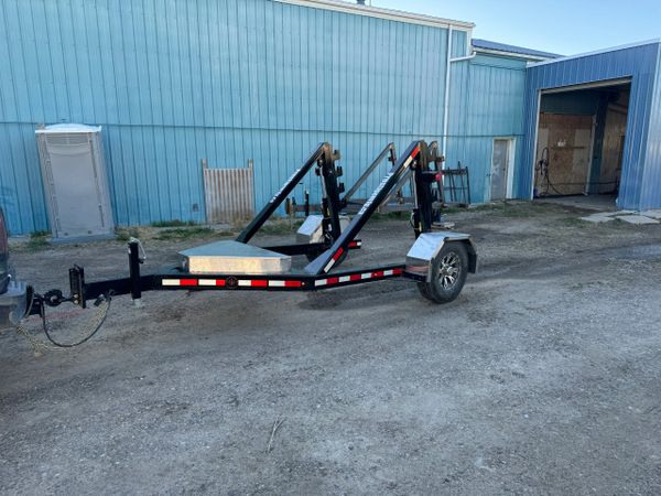 Black prestige mfg reel trailer with stainless steel tool box.
