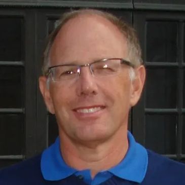 Dr. David Klebanow DDS smiling portrait | experienced dentist in Williston Park New York