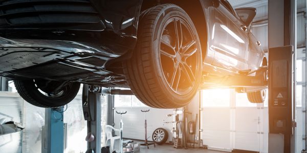 automotive lift installed in garage