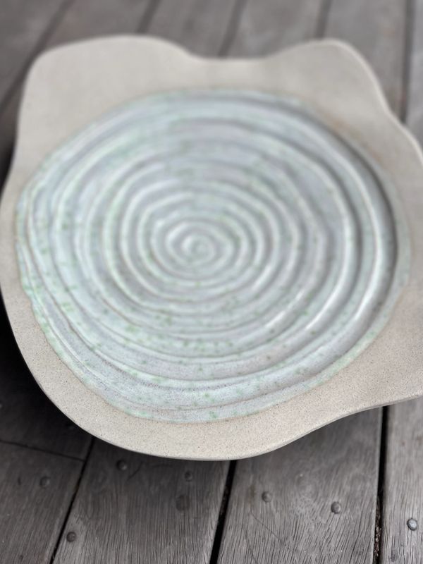 Hand carved pottery bowl.