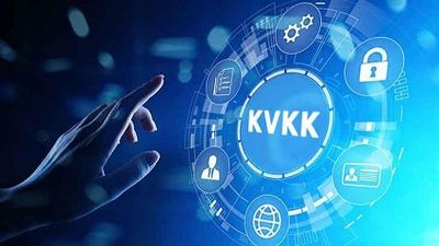 Hand interacts with a digital interface showing KVKK and security icons.