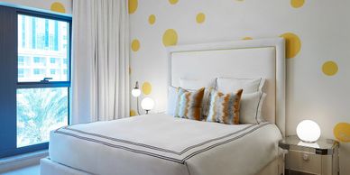 Funny yet elegant bedroom design with yellow bubbles theme