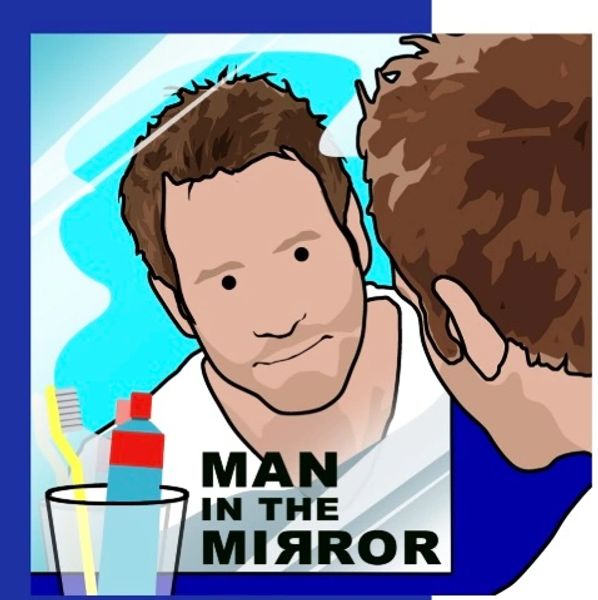 Man looking at his reflection in the mirror.