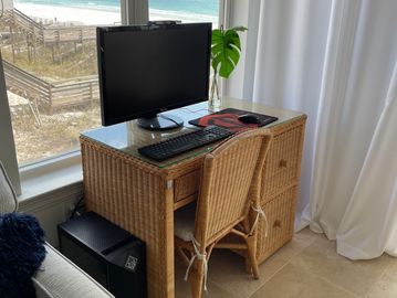 We provide a computer and desk for gaming or work.