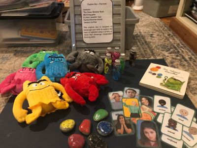 Board game with plush monsters and cards.