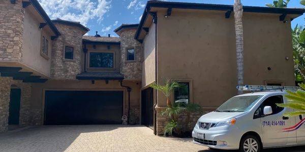 A New Star Painting evaluating exterior painting process in Yorba Linda