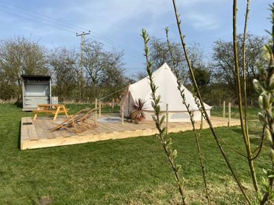 Bell Tent and deckchairs with kitchen