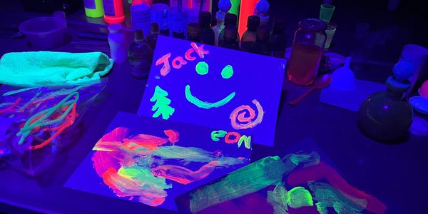a picture of a child's creation from one of science zone's luminous science workshops