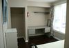A mid sized room right beside the ground floor bathrrom