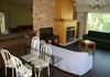 A 21 ft by 16ft living room, located on the main floor