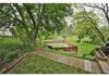 A beautiful backyard that is open to nature