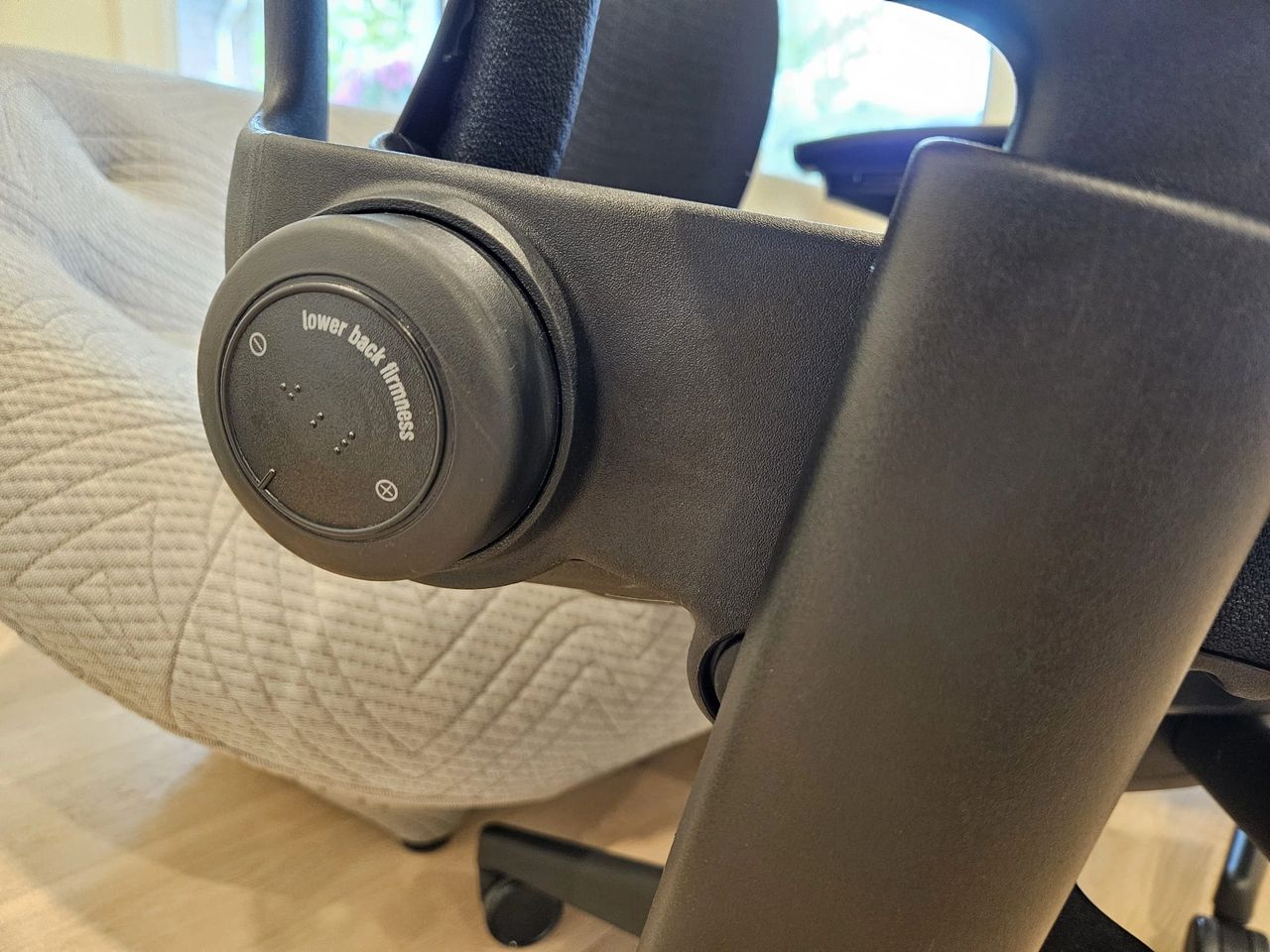 Grade "A" lower back adjustment wheel and arm trim of a Steelcase Leap v2. Grade "A" lower back adjustment wheel and arm trim of a Steelcase Leap v2.