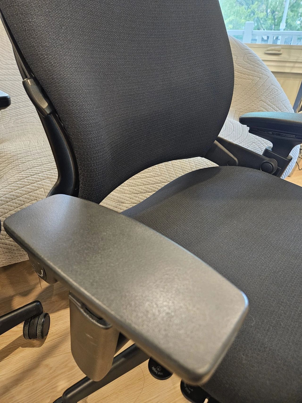 Grade "B" armrest of a Steelcase Leap v2