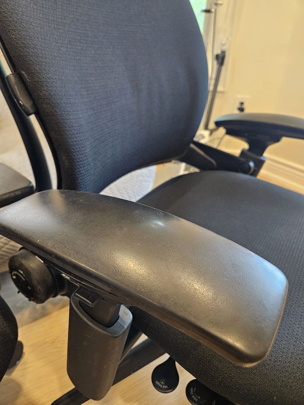 Grade "C" armrest of a Steelcase Leap v2