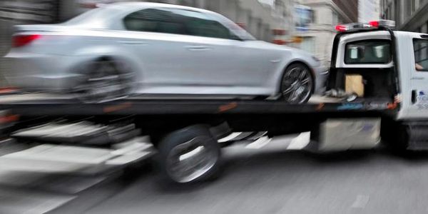 Truck taking a car on the display of the website