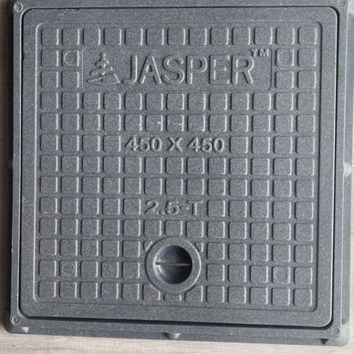 Square manhole cover with the inscription 'JASPER'.