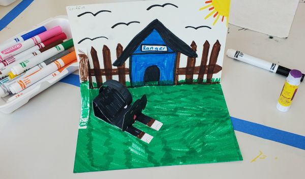 kids art, paper sculpture of a dog and dog house