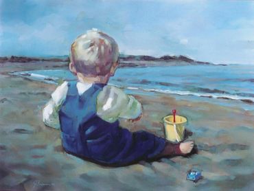 child playing on the beach