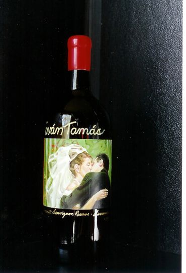 painted wine bottle with wedding art