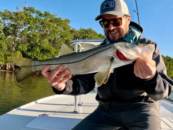 Flats fishing for redfish, snook, trout and tarpon. Book your fishing trip with Tightlines Charter.