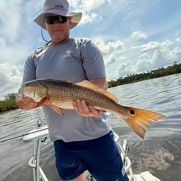 Clearwater florida family friendly fishing charters good for kids inshore fishing trips redfish trip