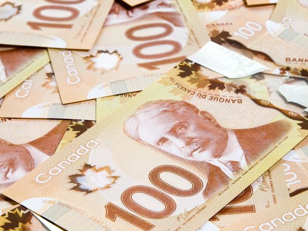 Canadian $100 bills used to buy vehicles